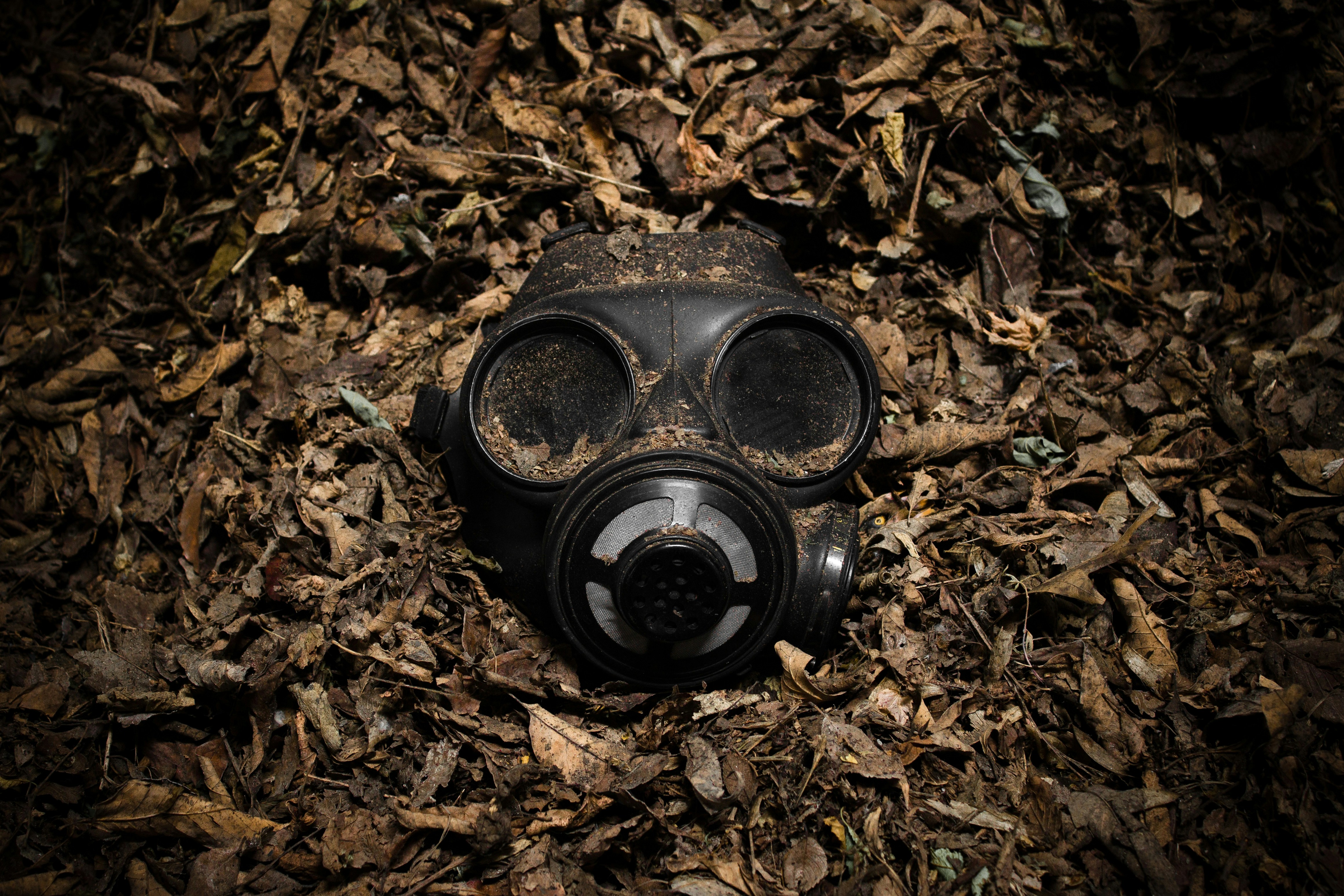 gas mask in ground for war