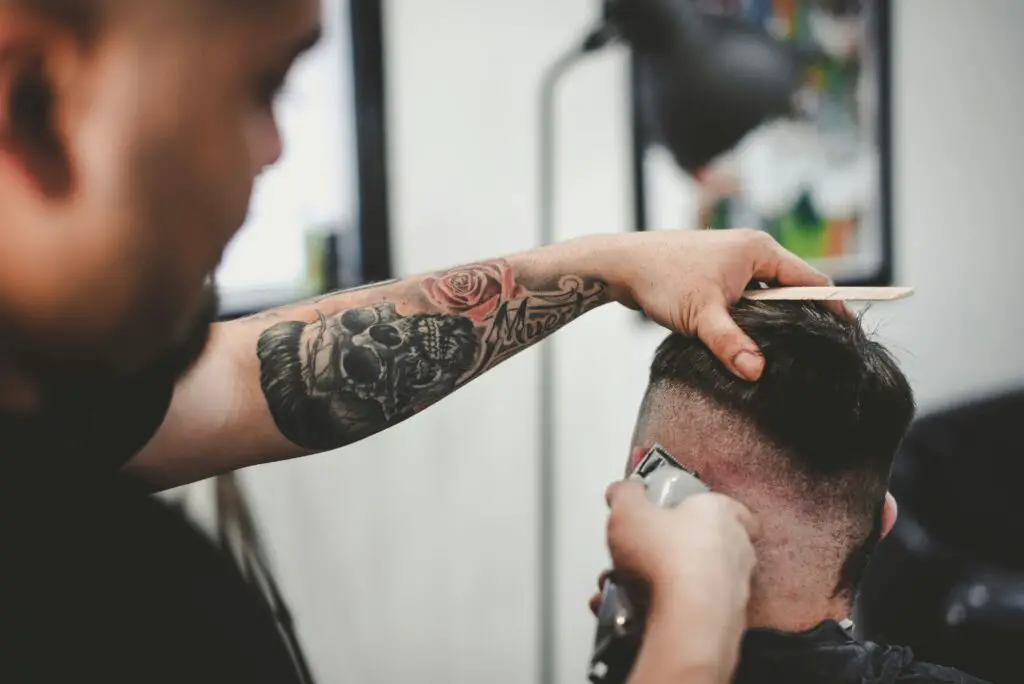 Forced haircuts generally are not legal, and can warrant charges like assault or battery